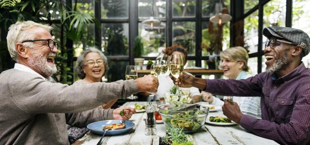 Group of senior retirement meet up happiness concept